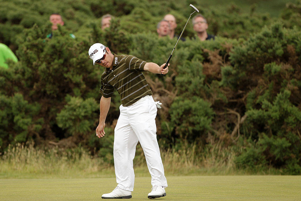 Louis Oosthuizen celebrates eagling St Andrews' ninth hole on his way to victory in The Open in 2010